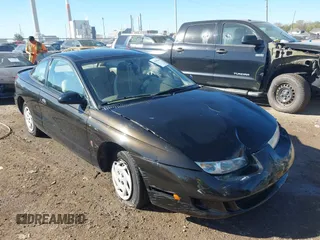 1997 Saturn SC z VIN 1G8ZE1283VZ163658, wystawiony jako IAAI lot #40494467 z przebiegiem 111 701 mil mil oraz . Historia ofert i sprzedaży dostępna na DreamBid. Obrazek 1.