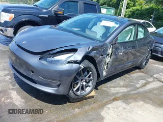 2023 Tesla Model 3 z VIN 5YJ3E1EA7PF413311, wystawiony jako IAAI lot #42442055 z przebiegiem 25 270 mil mil oraz . Historia ofert i sprzedaży dostępna na DreamBid. Obrazek 23.