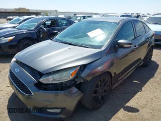 2016 Ford Focus SE with VIN 1FADP3F21GL268058, listed as a IAAI auction lot 42053944 with 103,785 mi miles and . Bid and sale history available at DreamBid. Image 6.