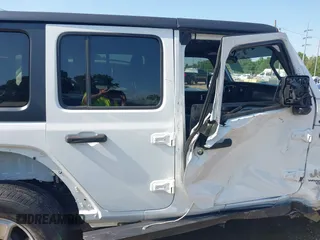 2020 Jeep Wrangler Unlimited Sport S with VIN 1C4HJXDG9LW237507, listed as a IAAI auction lot 42377928 with 48,217 mi miles and . Bid and sale history available at DreamBid. Image 13.