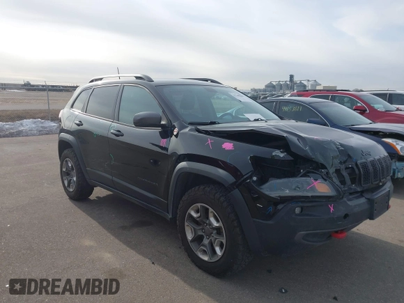 2019 Jeep Cherokee Trailhawk Elite with VIN 1C4PJMBX0KD395421, listed as a IAAI auction lot 41265048 with 70,070 mi miles. Bid and sale history available at carsss.com. Image 1.