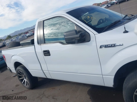 2014 Ford F-150 XL with VIN 1FTMF1CM3EKG36797, listed as a IAAI auction lot 40892574 with 136,417 mi miles. Bid and sale history available at carsss.com. Image 12.