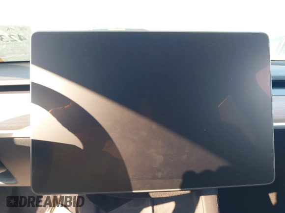 2023 Tesla Model Y Long Range with VIN 7SAYGDEE0PF671726, listed as a IAAI auction lot 42393616 with Not provided miles and . Bid and sale history available at DreamBid. Image 7.
