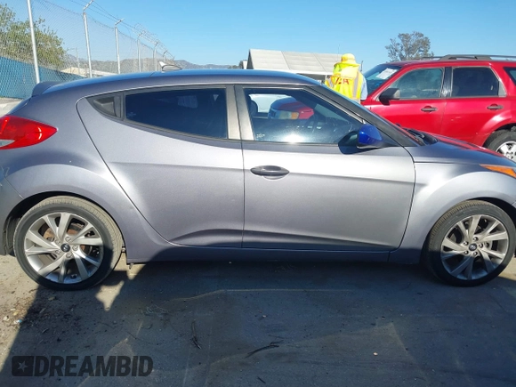 2016 Hyundai Veloster with VIN KMHTC6AD3GU283985, listed as a IAAI auction lot 41872103 with 153,949 mi miles. Bid and sale history available at carsss.com. Image 13.