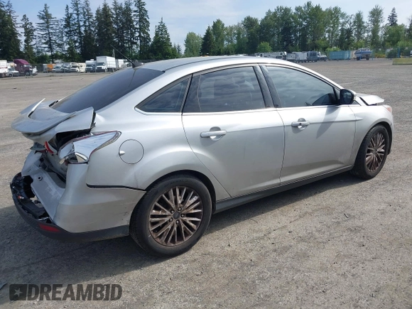 2016 Ford Focus Titanium with VIN 1FADP3J20GL238914, listed as a IAAI auction lot 42338977 with 126,276 mi miles and . Bid and sale history available at DreamBid. Image 4.