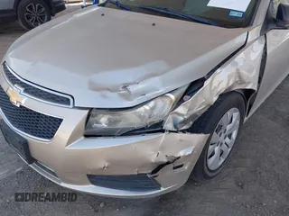 2014 Chevrolet Cruze LS with VIN 1G1PA5SG5E7116532, listed as a IAAI auction lot 41915374 with 143,893 mi miles and . Bid and sale history available at DreamBid. Image 6.