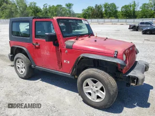 2008 Jeep Wrangler X with VIN 1J4FZ24188L607332, listed as a Copart auction lot 54507785 with 184,153 mi miles and Salvage title. Bid and sale history available at DreamBid. Image 4.