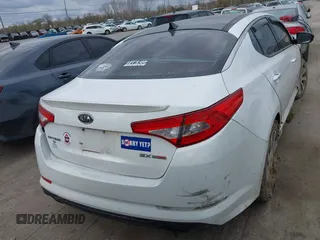 2012 Kia Optima SX with VIN 5XXGR4A6XCG079419, listed as a IAAI auction lot 41989957 with 159,794 mi miles and . Bid and sale history available at carsss.com. Image 16.