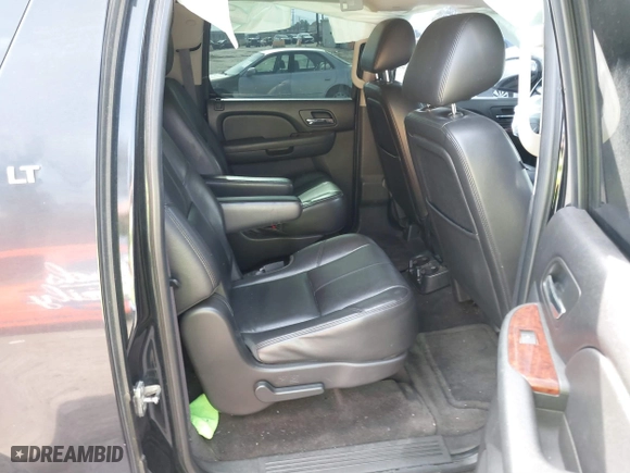 2012 Chevrolet Suburban LT with VIN 1GNSCJE0XCR257186, listed as a IAAI auction lot 41597580 with 174,284 mi miles. Bid and sale history available at carsss.com. Image 8.