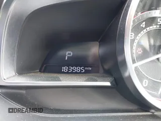 2014 Mazda 3 s Touring with VIN JM1BM1L35E1208952, listed as a IAAI auction lot 42121077 with 183,985 mi miles. Bid and sale history available at carsss.com. Image 7.