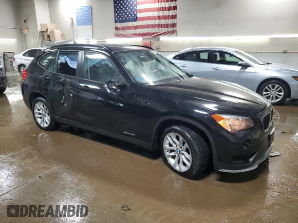 2015 BMW X1 xDrive28i z VIN WBAVL1C51FVY28965, wystawiony jako Copart lot #50895115 z przebiegiem 53 133 mil mil oraz Szkoda całkowita • Salvage title. Historia ofert i sprzedaży dostępna na DreamBid. Obrazek 4.