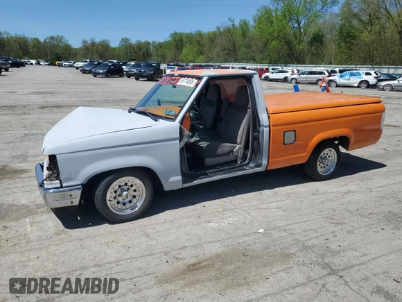 1992 Ford Ranger with VIN 1FTCR10AXNUC80706, listed as a Copart auction lot 55174895 with 87,000 mi miles and Salvage title. Bid and sale history available at DreamBid. Image 1.