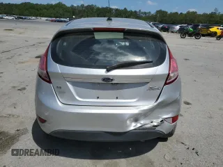 2019 Ford Fiesta SE z VIN 3FADP4EJ2KM142992, wystawiony jako Copart lot #55204795 z przebiegiem 98 018 mil mil oraz Szkody całkowita. Historia ofert i sprzedaży dostępna na DreamBid. Obrazek 6.