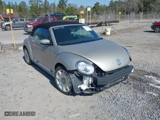 2013 Volkswagen Beetle Convertible 2.5L with VIN 3VW5X7AT9DM816045, listed as a IAAI auction lot 41488594 with 51,572 mi miles. Bid and sale history available at carsss.com. Image 1.