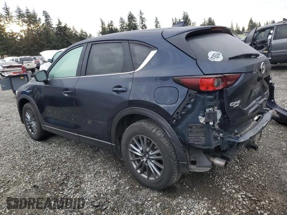 2017 Mazda CX-5 Touring with VIN JM3KFBCL4H0181101, listed as a Copart auction lot 45736515 with 89,354 mi miles and Salvage Title. Bid and sale history available at carsss.com. Image 2.