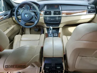 2014 BMW X6 xDrive35i z VIN 5UXFG2C53E0C42900, wystawiony jako Copart lot #55641745 z przebiegiem 156 045 mil mil oraz Tytuł czysty. Historia ofert i sprzedaży dostępna na DreamBid. Obrazek 8.