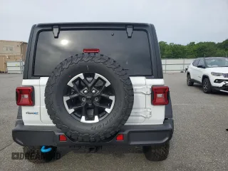 2025 Jeep Wrangler Rubicon z VIN 1C4RJXR66SW602471, wystawiony jako Copart lot #58302595 z przebiegiem 297 mil mil oraz Czysty tytuł • Clean title. Historia ofert i sprzedaży dostępna na DreamBid. Obrazek 6.