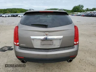 2011 Cadillac SRX Luxury Collection z VIN 3GYFNAEY8BS619208, wystawiony jako Copart lot #58321585 z przebiegiem 176 560 mil mil oraz Nie do naprawy • Non repairable. Historia ofert i sprzedaży dostępna na DreamBid. Obrazek 6.