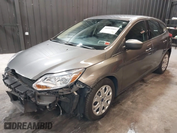 2012 Ford Focus SE with VIN 1FAHP3K22CL394088, listed as a IAAI auction lot 40953085 with 147,259 mi miles and . Bid and sale history available at carsss.com. Image 19.