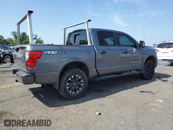 2018 Nissan Titan SV with VIN 1N6AA1E50JN514802, listed as a Copart auction lot 62342875 with 101,593 mi miles and Salvage title. Bid and sale history available at DreamBid. Image 3.