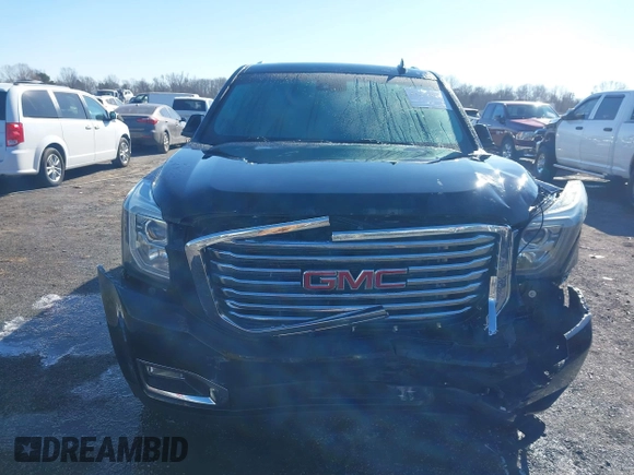 2016 GMC Yukon XL SLT with VIN 1GKS2GKC0GR443634, listed as a IAAI auction lot 41379064 with 121,744 mi miles. Bid and sale history available at carsss.com. Image 6.