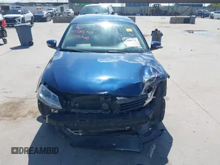 2014 Volkswagen Jetta SE z VIN 3VWD17AJ9EM402714, wystawiony jako IAAI lot #42088715 z przebiegiem 115 291 mil mil oraz . Historia ofert i sprzedaży dostępna na DreamBid. Obrazek 12.