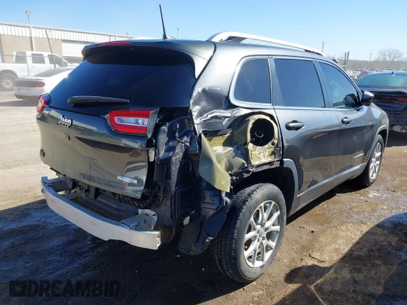 2016 Jeep Cherokee 75th Anniversary with VIN 1C4PJLCB2GW160141, listed as a IAAI auction lot 41748822 with 87,411 mi miles. Bid and sale history available at carsss.com. Image 4.