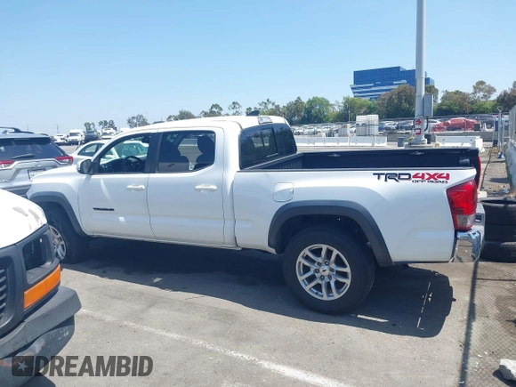 2017 Toyota Tacoma SR5 with VIN 3TMDZ5BN5HM021139, listed as a IAAI auction lot 42555465 with 139,782 mi miles and . Bid and sale history available at DreamBid. Image 13.