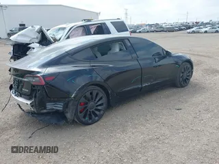 2021 Tesla Model 3 Performance with VIN 5YJ3E1EC5MF919278, listed as a IAAI auction lot 40194677 with 50,484 mi miles and . Bid and sale history available at carsss.com. Image 4.