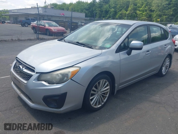 2012 Subaru Impreza Premium with VIN JF1GPAD68CH219928, listed as a IAAI auction lot 42362379 with 209,514 mi miles and . Bid and sale history available at DreamBid. Image 2.