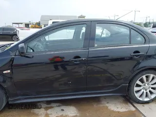2009 Mitsubishi Lancer with VIN JA3AU86W29U039924, listed as a IAAI auction lot 41923692 with 183,591 mi miles and . Bid and sale history available at DreamBid. Image 15.