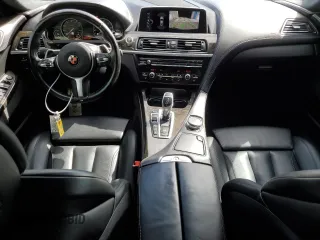 2017 BMW 6 Series z VIN WBA6D2C31HGT73273, wystawiony jako Copart lot #67705734 z przebiegiem 75 080 mil mil oraz Szkoda całkowita • Salvage title. Historia ofert i sprzedaży dostępna na DreamBid. Obrazek 8.