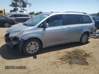 2012 Toyota Sienna XLE AAS with VIN 5TDYK3DC1CS204598, listed as a Copart auction lot 62293015 with 76,108 mi miles and Salvage title. Bid and sale history available at DreamBid. Image 1.