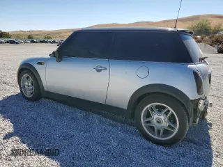 2002 MINI Hardtop with VIN WMWRC33472TC34281, listed as a Copart auction lot 71631644 with 196,947 mi miles and Salvage Title. Bid and sale history available at DreamBid. Image 2.