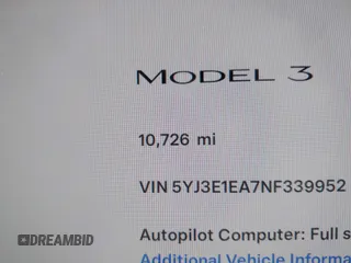 2022 Tesla Model 3 with VIN 5YJ3E1EA7NF339952, listed as a IAAI auction lot 38007332 with 10,726 mi miles. Bid and sale history available at carsss.com. Image 7.