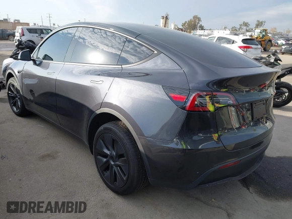 2025 Tesla Model Y Long Range with VIN 7SAYGDED6SF229498, listed as a IAAI auction lot 41086718 with 509 mi miles and . Bid and sale history available at DreamBid. Image 3.