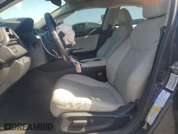 2019 Honda Insight Touring with VIN 19XZE4F90KE015579, listed as a Copart auction lot 58821075 with 26,560 mi miles and Salvage title. Bid and sale history available at DreamBid. Image 7.