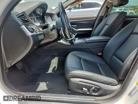 2016 BMW 5 Series 528i with VIN WBA5A5C59GD528109, listed as a Copart auction lot 61691405 with 107,837 mi miles and Salvage title. Bid and sale history available at DreamBid. Image 7.
