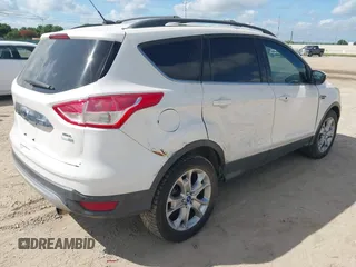 2013 Ford Escape SEL с VIN 1FMCU9HX0DUB55357, выставлен на аукционе IAAI как лот 42476929 с пробегом 148 421 миль миль и . История ставок и продаж доступна на DreamBid. Изображение 4.