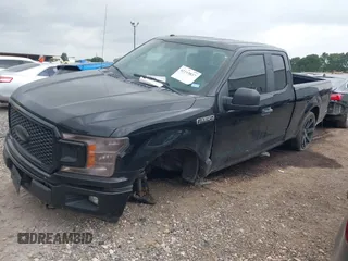 2018 Ford F-150 XL with VIN 1FTEX1EP1JKC22405, listed as a IAAI auction lot 42143837 with 111,597 mi miles and . Bid and sale history available at DreamBid. Image 2.