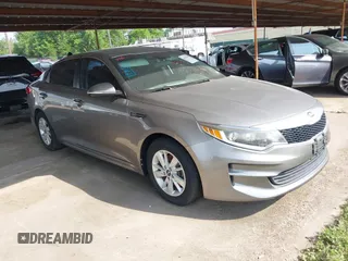 2018 Kia Optima LX z VIN 5XXGT4L33JG212605, wystawiony jako IAAI lot #41933759 z przebiegiem 54 286 mil mil oraz . Historia ofert i sprzedaży dostępna na DreamBid. Obrazek 1.