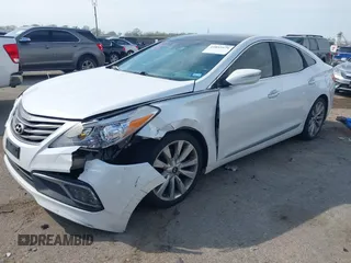2015 Hyundai Azera Limited with VIN KMHFH4JG7FA476458, listed as a IAAI auction lot 41893979 with 149,114 mi miles and . Bid and sale history available at DreamBid. Image 17.