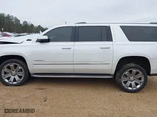 2016 GMC Yukon XL Denali with VIN 1GKS1HKJ8GR306576, listed as a IAAI auction lot 41518187 with 208,586 mi miles. Bid and sale history available at carsss.com. Image 15.