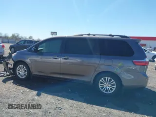 2015 Toyota Sienna XLE with VIN 5TDYK3DC4FS634937, listed as a IAAI auction lot 41869781 with 65,561 mi miles and . Bid and sale history available at carsss.com. Image 14.