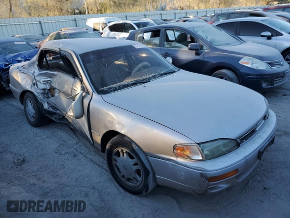 1995 Toyota Camry LE with VIN 4T1GK12E5SU76389, listed as a Copart auction lot 83120474 with 245,875 mi miles and Non Repairable. Bid and sale history available at carsss.com. Image 4.