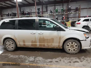 2018 Dodge Grand Caravan SE with VIN 2C4RDGBG0JR180361, listed as a IAAI auction lot 41064126 with 135,841 mi miles. Bid and sale history available at carsss.com. Image 13.