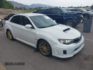 2011 Subaru Impreza Sedan WRX WRX with VIN JF1GV7E62BG524076, listed as a IAAI auction lot 40582067 with 123,109 mi miles. Bid and sale history available at carsss.com. Image 1.