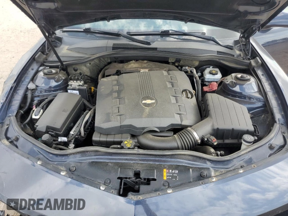 2013 Chevrolet Camaro LS z VIN 2G1FA1E36D9179469, wystawiony jako Copart lot #53968305 z przebiegiem 173 426 mil mil oraz Szkoda całkowita • Salvage title. Historia ofert i sprzedaży dostępna na DreamBid. Obrazek 11.