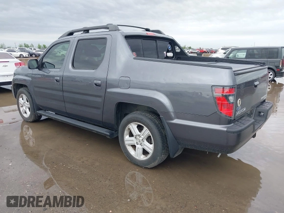 2014 Honda Ridgeline RTL with VIN 5FPYK1F50EB002577, listed as a IAAI auction lot 41931258 with 147,665 mi miles. Bid and sale history available at carsss.com. Image 3.