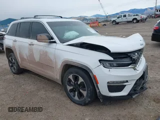 2023 Jeep Grand Cherokee with VIN 1C4RJYB69PC595962, listed as a IAAI auction lot 40878593 with 30,343 mi miles and . Bid and sale history available at DreamBid. Image 1.